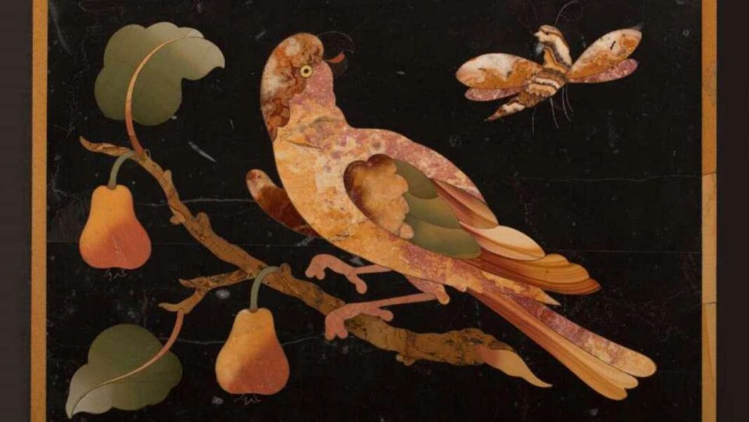 Quadro di un uccello realizzato con pittura con pietra